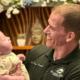 Why Kids and Infants Need Chiropractic Too featuring Dr Joe holding a happy infant